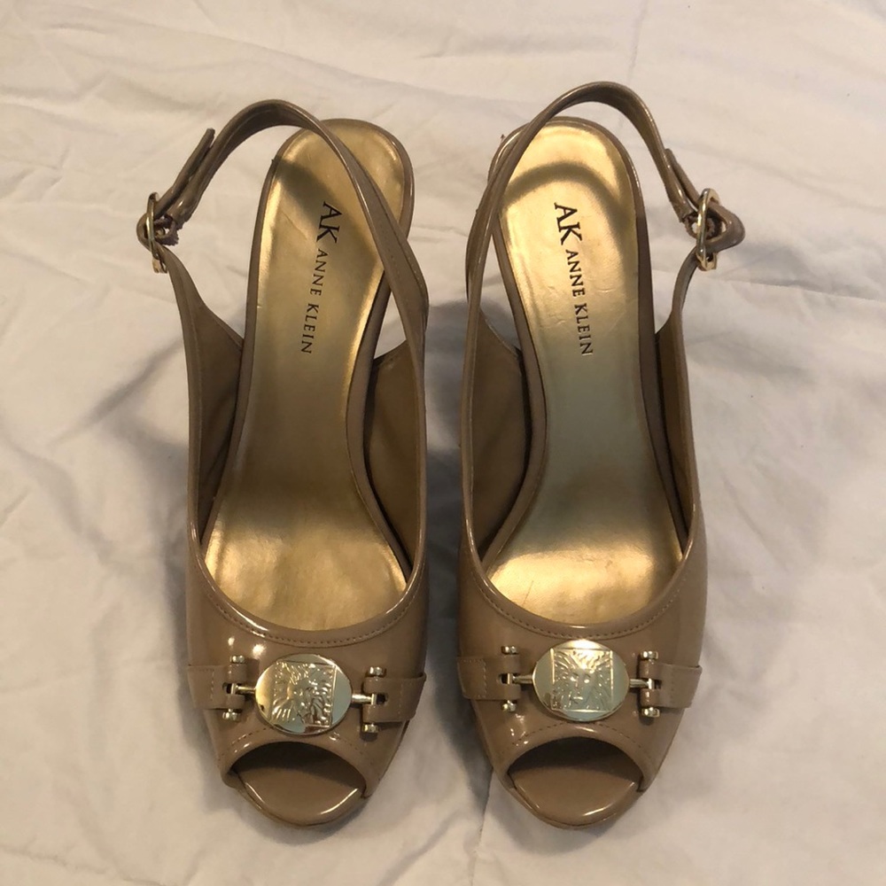 Tan peep toe pumps